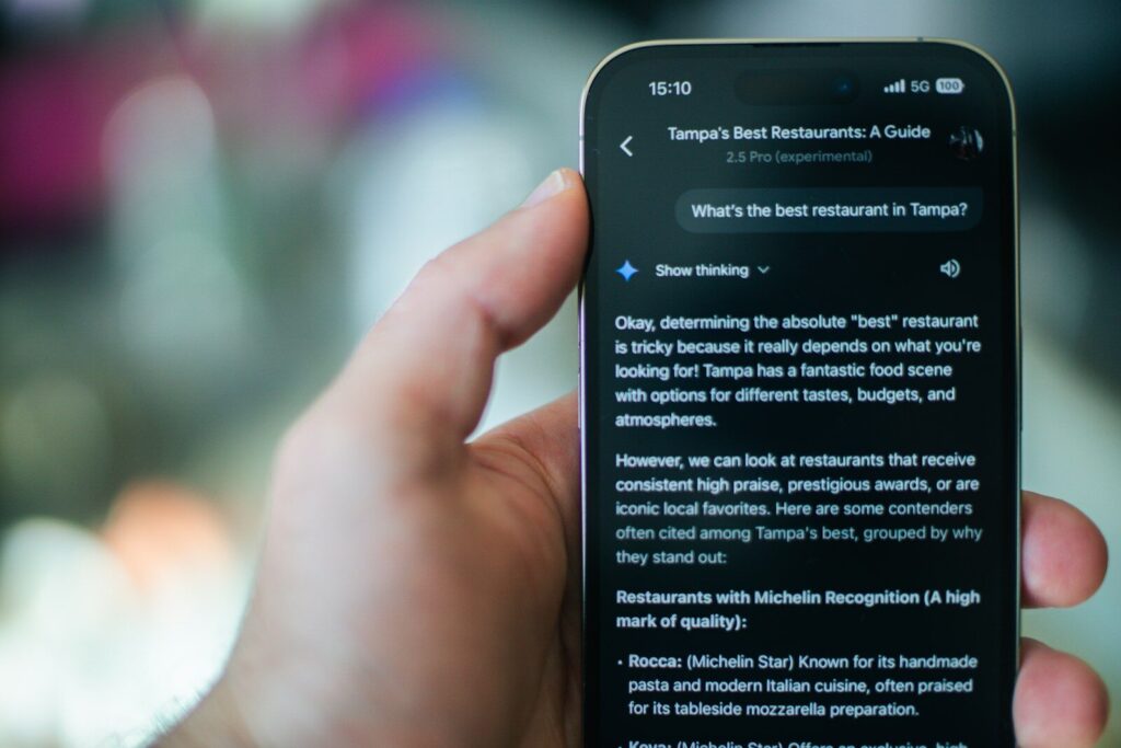 Someone is using their phone to find a restaurant.